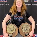 Shelby Moore shows off some of the impressive hardware she earned during a championship effort at wrestling nationals. Submitted photo