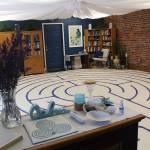 Nickie Lynn's 22x22-foot labyrinth takes up nearly the entire floor space in her Myrtle Avenue location. Photo by Ray Miller-Still
