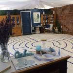 Nickie Lynn's 22x22-foot labyrinth takes up nearly the entire floor space in her Myrtle Avenue location. Photo by Ray Miller-Still