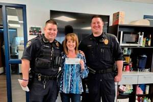 Pictured is Commander Tim Floyd, Anne Gannom of COUNTRY Financial, and Commander Tony Ryan. Submitted photo