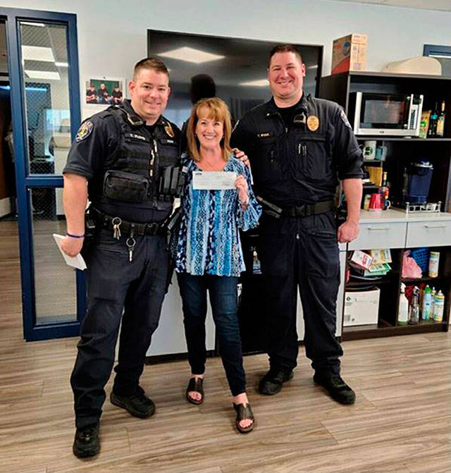 Pictured is Commander Tim Floyd, Anne Gannom of COUNTRY Financial, and Commander Tony Ryan. Submitted photo