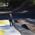 John Hillding stands in the center of the Bacon and Eggs skatepark, which he designed. The Wilkeson skatepark came about from a state grant, Grindline Skateparks, organizing by Hillding and city leaders, and a lot of volunteers. Photo by Alex Bruell