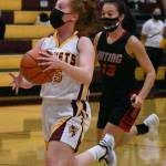 Kara Marecle became the seventh player in the history of White River girls basketball to score more than 1,000 points. Here, she drives for two more during Friday nights home victory. Photo by Kevin Hanson