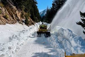 WSDOT workers clearing snow at Chinook Pass this year. Photo by Washington State Department of Transportation