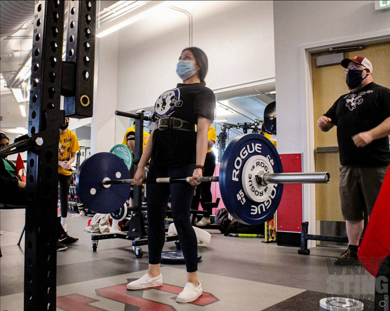 White Rivers Yulisa Martinez-Ponce dead lifts 245 pounds on the way to a state powerlifting championship. Photo courtesy Ella Moyer