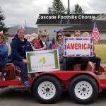 SUBMITTED PHOTO Cascade Foothills Chorale members show their spirit, and their appreciation, with this entry into Enumclaws 2019 Fourth of July parade.