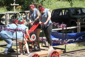 Photo by Ray Miller-Still 
Unless youre extra burley, Wilkeson Handcar Races competitors often need a team of four people to race their handcar down the 400-foot-plus railroad track.