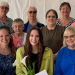 Local P.E.O. members pose for a picture with Isabella Hoyer, who recently won a scholarship from the women's organization. Front row, from left to right: Nancy West, Dawn Hoyer (Isabella's mother), Isabella, and Cherl Schneider. Middle row: Cherie Murchie, Sue Vannatter, Heidi Russell, and Kay Raeder. Back row: Sue Reiter, Linda Irrgang, Linda Fisher, Eva Dietz, and Martha Blodgett. Photo taken by Maggie Baumann, courtesy P.E.O.