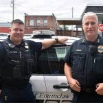 Tim Floyd, left, became chief of the Enumclaw Police Department July 1 following the retirement of former chief Bob Huebler, left. Photo by Alex Bruell