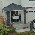 Ten Trails celebrated the moving-in of their 500th family recently in this photo contributed by Oakpointe.