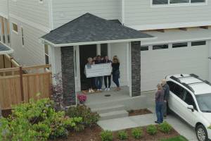 Ten Trails celebrated the moving-in of their 500th family recently in this photo contributed by Oakpointe.