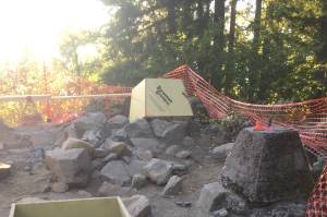 PHOTO COURTESY MARK COUNTRYMAN 
The top of Mount Peak has been something of a construction zone as crews prepare for the footings that will secure the coming lookout tower.