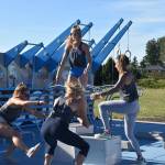 Photo by Alex Bruell 
Members of The Claw Crossfit take the new Fitness Court out for a spin.