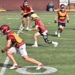 PHOTOS BY KEVIN HANSON Football teams at Enumclaw and White River have been practicing since Aug. 18, preparing for Fridays season openers.