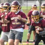 PHOTOS BY KEVIN HANSON Football teams at Enumclaw and White River have been practicing since Aug. 18, preparing for Fridays season openers.