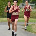 PHOTOS BY KEVIN HANSON The Enumclaw High cross country program hosted its only home meet of the season on the afternoon of Sept. 22. The Hornets hosted Washington and Foss high schools, competing on the 3.1-mile course at the Enumclaw Expo Center. The EHS boys defeated the Washington Patriots, while Foss entered only one runner. On the girls side, Washington was the automatic winner as both Enumclaw and Foss could not field a full team. In these photos, Enumclaws Evan Cheney, left, and Trevor Storm are at the front of the pack (and went on to claim first and second place, respectively). Shown at the start of the girls race are, from left, Enumclaws Ahna Lemeshko, Lindsay Essex and Ava Sawyer. For details about the South Puget Sound League 2A meet, see Sports Roundup.