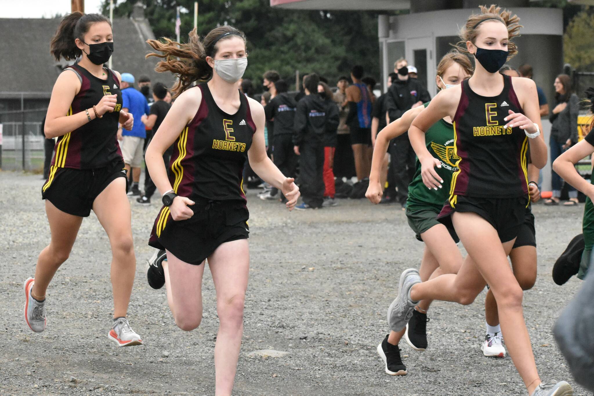 PHOTOS BY KEVIN HANSON The Enumclaw High cross country program hosted its only home meet of the season on the afternoon of Sept. 22. The Hornets hosted Washington and Foss high schools, competing on the 3.1-mile course at the Enumclaw Expo Center. The EHS boys defeated the Washington Patriots, while Foss entered only one runner. On the girls side, Washington was the automatic winner as both Enumclaw and Foss could not field a full team. In these photos, Enumclaws Evan Cheney, left, and Trevor Storm are at the front of the pack (and went on to claim first and second place, respectively). Shown at the start of the girls race are, from left, Enumclaws Ahna Lemeshko, Lindsay Essex and Ava Sawyer. For details about the South Puget Sound League 2A meet, see Sports Roundup.