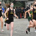 PHOTOS BY KEVIN HANSON The Enumclaw High cross country program hosted its only home meet of the season on the afternoon of Sept. 22. The Hornets hosted Washington and Foss high schools, competing on the 3.1-mile course at the Enumclaw Expo Center. The EHS boys defeated the Washington Patriots, while Foss entered only one runner. On the girls side, Washington was the automatic winner as both Enumclaw and Foss could not field a full team. In these photos, Enumclaws Evan Cheney, left, and Trevor Storm are at the front of the pack (and went on to claim first and second place, respectively). Shown at the start of the girls race are, from left, Enumclaws Ahna Lemeshko, Lindsay Essex and Ava Sawyer. For details about the South Puget Sound League 2A meet, see Sports Roundup.