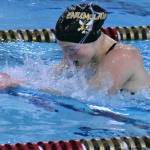 PHOTOS BY KEVIN HANSON
Swimmers and divers from Enumclaw and White River gathered Thursday afternoon for a virtual meet against the Steilacoom Sentinels. The Plateau athletes registered times and totals at the Enumclaw Aquatic Center and Sentinels coaches did the same on their end. Numbers were merged and results tallied (find details in Sports Roundup). Shown here are White River diver Mackenzie Hale and, doing the breaststroke, Enumclaw's Anna Bogh.