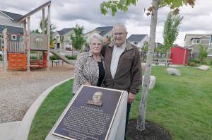 Courtesy photo 
Keith Watson and his wife Judy at the newly-renamed Keith Watson Park, located at the intersection of SE Cottonwood Street and Birch Ave SE. The plaque at the park gives a short history of Watsons involvement in Black Diamond.