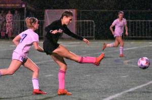 Junior forward Sofia Smits delivers a shot toward the Fife goal during Enumclaws home match against the Trojans on Oct. 14. Photo by Kevin Hanson