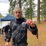 Photo courtesy Jim Hackiewicz 
Tony Beaumont shares a tiny piece of pottery found in the water in Lake Sawyer.