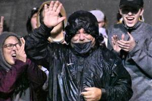 PHOTO BY KEVIN HANSON Joined by family and surrounded by members of this years White River High football team, Bob Walker was honored last week for his longtime dedication and contributions to the Hornet program. A special presentation took place during halftime of the Oct. 21 contest between White River and Franklin Pierce, the teams final home game of the season. Walker is retiring from coaching after more than three decades as a Hornet assistant, having worked under seven head coaches at both historic Sheets Field and the current Arrow Lumber Stadium.