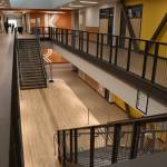 A common space on the south side of Glacier Middle School is flanked by two sets of stairs leading to the second floor. The unusual looking area is designed that way to encourage creative interactions between students, assistant superintendent Scott Harrison said, rather than simply ferry them from one class to the next.