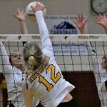 PHOTOS BY KEVIN HANSON A Hornet-Hornet volleyball battle played out Oct. 27 in the White River gymnasium, with the home team emerging on the winning end of a 3-1 score. Here, Enumclaws Kira HaWaaboo (#2) sets up a teammate as Rosie Penke moves into position. Later in the match, White Rivers Abby Barrow and Audrey Berg (6) are tough at the net as Enumclaws Macy Furtwangler goes for a kill.