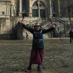 Becky Rush-Peet stands triumphantly in front of the Cathedral of St. James in the city of Santiago de Compostella, the end of her nearly 500-mile and 49 day journey on the Camino de Santiago.