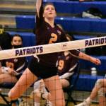 Elle Thomas goes high for a kill against North Kitsap, White Rivers first opponent during last weeks district tournament. Photo by Kevin Hanson