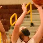 FILE PHOTO BY KEVIN HANSON 
One of the Plateaus top returning players is Enumclaw High senior Rosie Penke who earned first team all-league honors a season ago. Here, she goes up for two points during a game last season.
