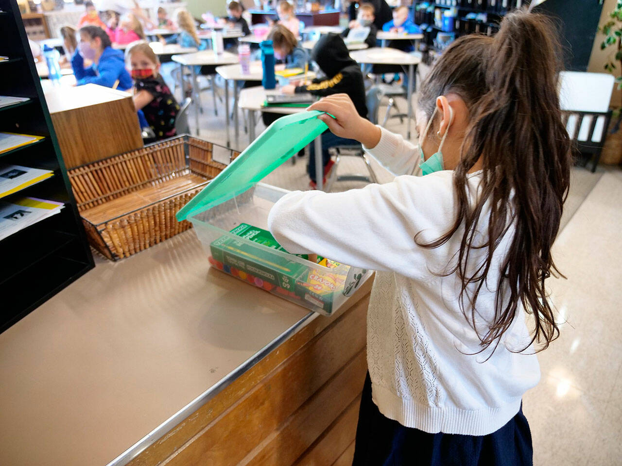 The Enumclaw School District and its board of directors say they must follow the statewide mask mandate or risk losing three-quarters of its funding. Pictured is a student from Sunrise Elementary. Photo courtesy Enumclaw School District