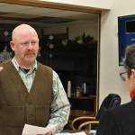 Buckley Mayor-elect Beau Burkett takes his oath of office from outgoing Mayor Pat Johnson. Photo by Alex Bruell