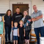 Luke and Sarah Lenihan with daughter Remi (6), son Ryker (4), and newborn son Reuben. Every year, Guardian Roofing helps a family in the community that needs a hand through the Halo Project.