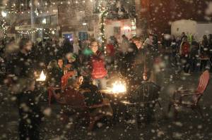 Photo by Ray Miller-Still 
Visitors to Cole Street have been enjoying weekly snow events every Friday from 5 to 5:30, when portions of the street close to allow folks to enjoy food and drinks outdoors around fire pits (if the weather is clear). Going into January, the snow events are expected to move to Saturdays at the same time.