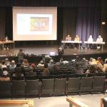 More than a dozen local residents  including students  spoke at the Nov. 22 Enumclaw School Board meeting, while audience members, filling up half the high school auditorium, showed their support for speakers with enthusiastic applause. Photo by Ray Miller-Still