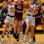It was a Hornet-Hornet battle for a rebound Friday night when the girls teams from White River and Enumclaw met in Buckley. Coming away with the ball is White River freshman Vivian Kingston; also in the scramble are teammate Josie Jacobs and Enumclaws Bella Firnkoess (21). Photo by Kevin Hanson