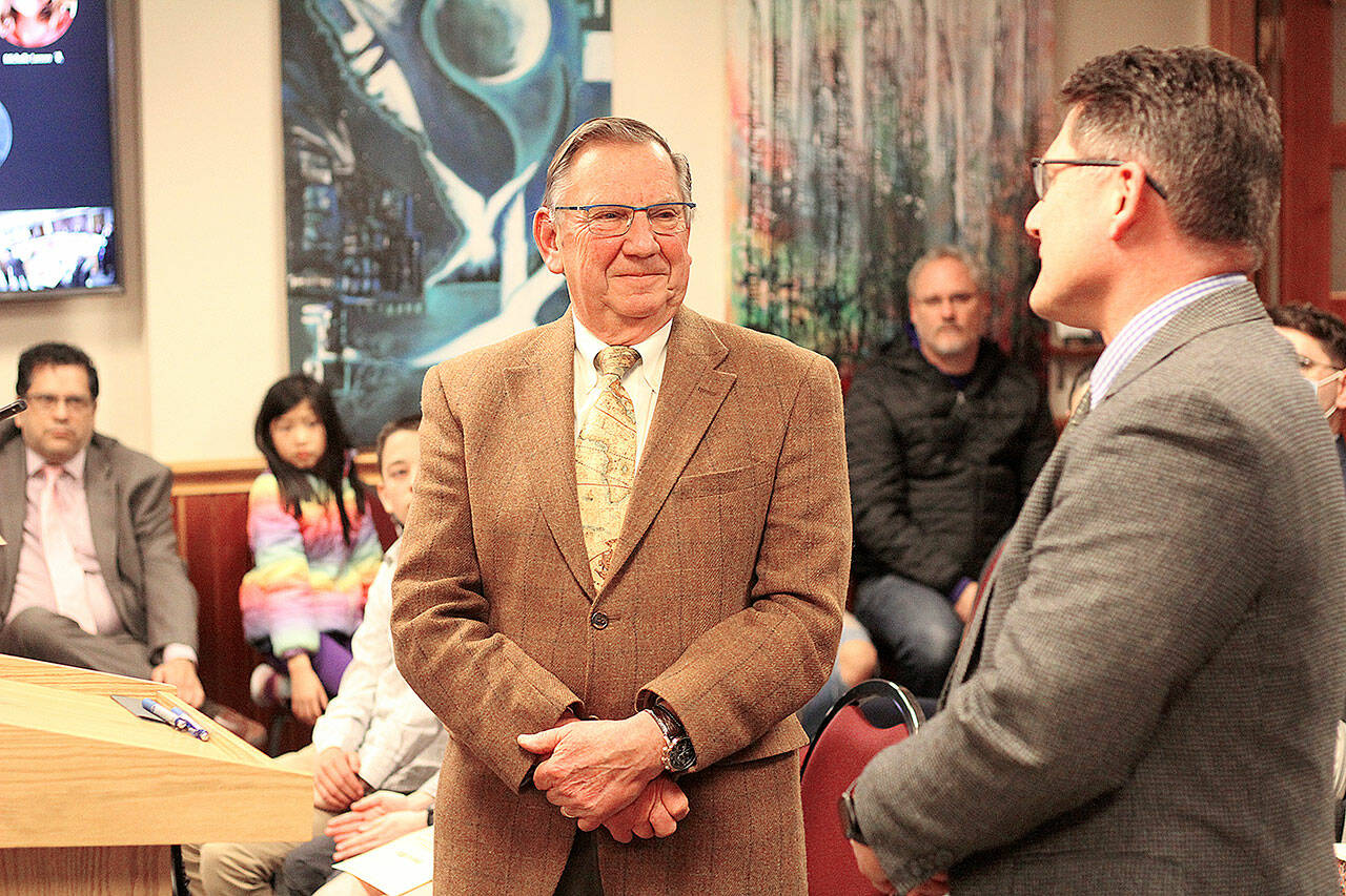 Mike Reynolds, Enumclaws former city attorney, was celebrated by elected officials and staff members during the Jan. 10 meeting  his last of his 42-year stint. Photo by Ray Miller-Still