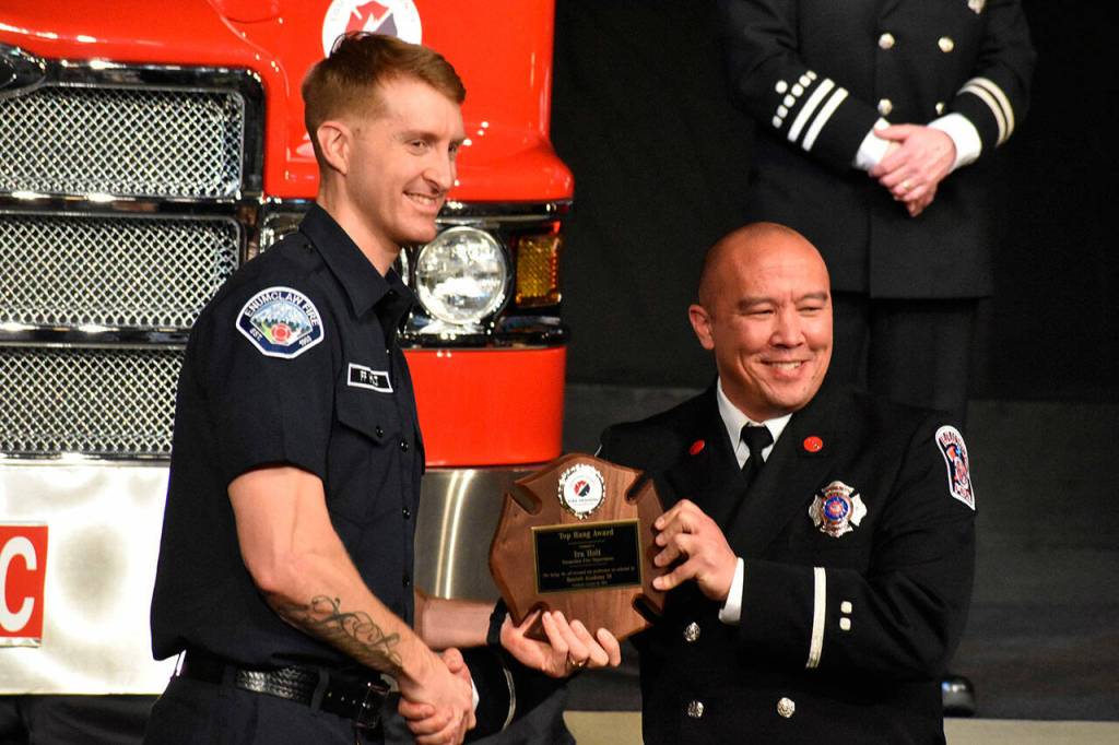 Ira Holt, joining the Enumclaw Fire Department, accepts the Valedictorian award. Photo by Alex Bruell