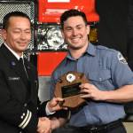 Photo by Alex Bruell 
Jacob Johnson of Mountain View Fire & Rescue accepts the Marty Hauer Physical Fitness award.
