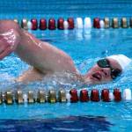 Enumclaw High swimmer McCade Walker competes in a freestyle event during a recent meet at the Enumclaw Aquatic Center.
