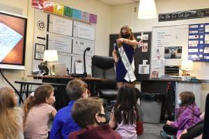 Photo by Alex Bruell 
The afternoon of Jan. 24, second graders in Lynda Smiths Mountain Meadow Elementary school grilled Ella Roehr with questions like: Do you like cake? Whats your favorite color? and Do you have a brother? during Roehrs visit to the class. Smith is one of Ellas former elementary school teachers.