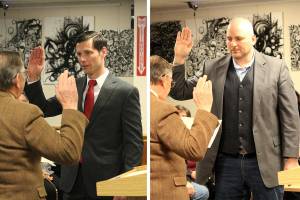 Chris Gruner, right, and Bobby Martines, left, taking their oath of office during the Jan. 10 meeting. Photos by Ray Miller-Still