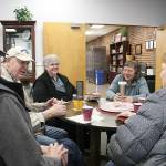 Left to right, Bill Kennedy, Joe Delmore, Darlene DeGroot, Tory Bennett, Cherie Hoselton (not pictured), and Annette Flechner enjoy using the Senior Center for their morning get-togethers on Mondays, Wednesdays, and Fridays after hitting up the local pool. Photo by Ray Miller-Still
