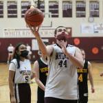Zach Gifford (44) makes a shot. Photo by Ray Miller-Still