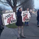 Photo by Ray Miller-Still 
A small group on Griffin Avenue in Enumclaw supporting voting Yes on the local school district levy hours before ballots were due.