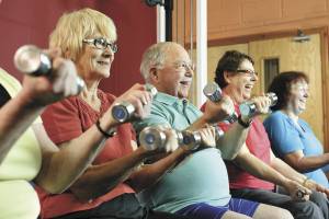 Lifting weights or using a resistance band for exercise is a great way for seniors to build strength. Image courtesy Metro Creative Connections