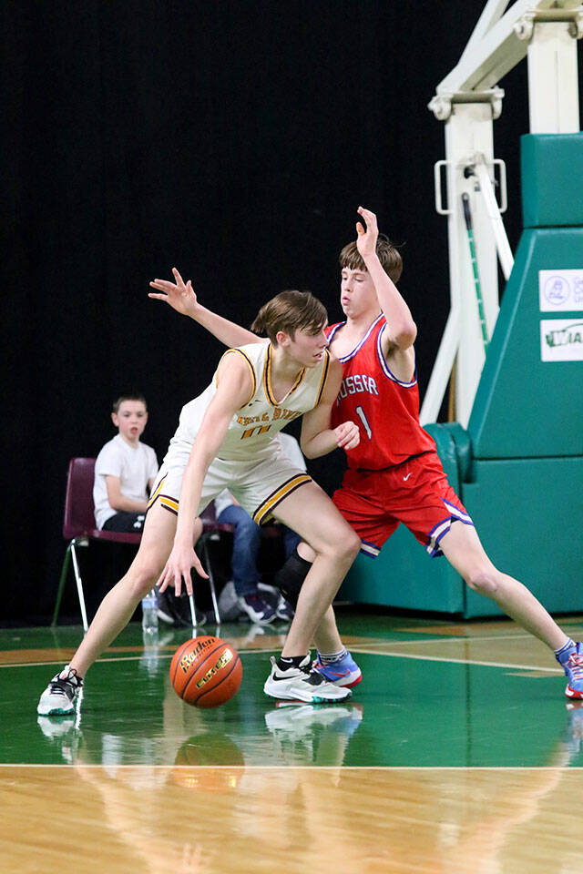 White Rivers Rylan Donovan looking to get around his Prosser opponent. Photo courtesy Northwest Sports Photography