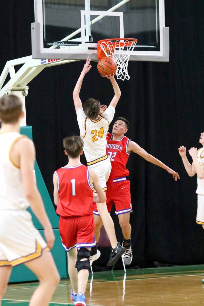 WRHS senior Carson Voellger attempts a layup during the Hornets final state game against Prosser. Photo courtesy Northwest Sports Photography